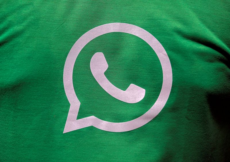 © Reuters. FILE PHOTO: FILE PHOTO: A logo of WhatsApp is pictured on a T-shirt worn by a WhatsApp-Reliance Jio representative during a drive by the two companies to educate users, on the outskirts of Kolkata