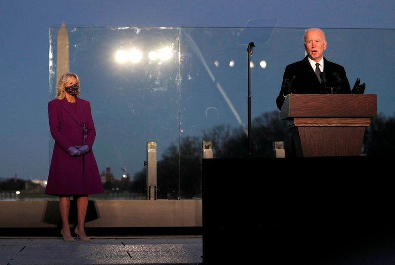 &copy; Reuters. FILE PHOTO: Joe Biden attends COVID-19 memorial event in Washington