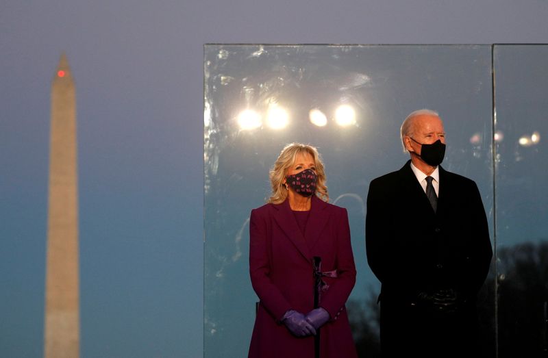 &copy; Reuters. FILE PHOTO: Joe Biden attends COVID-19 memorial event in Washington
