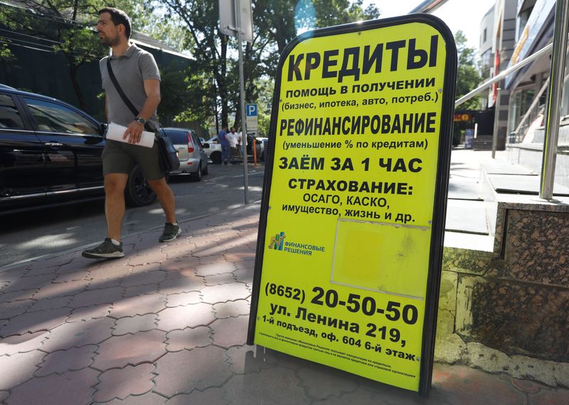 &copy; Reuters. An advertising board of a lending agency is on display in Stavropol