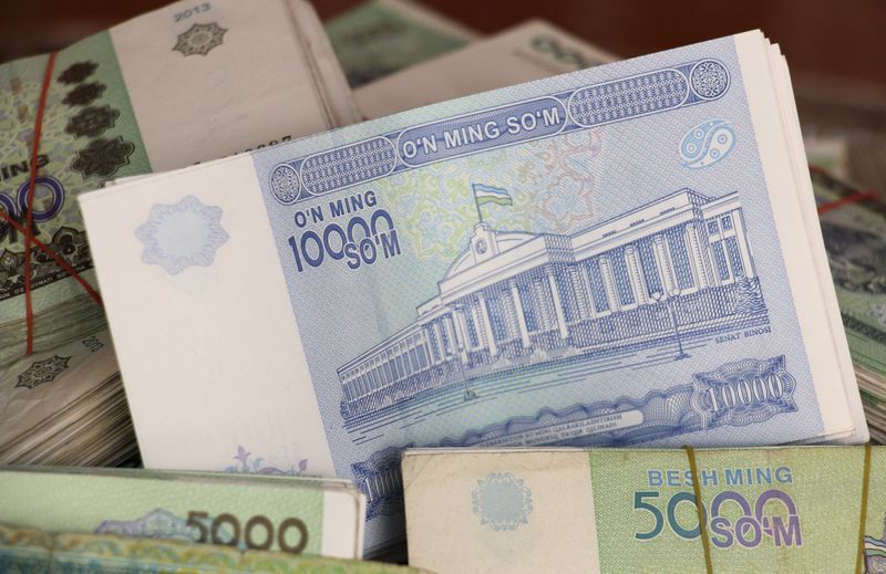 &copy; Reuters. Uzbekistani Som banknotes are seen in this picture illustration