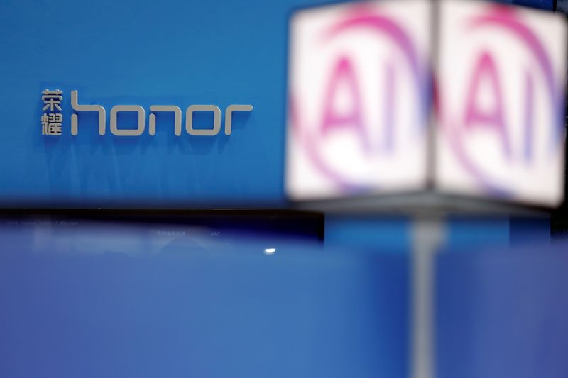 &copy; Reuters. Honor logo is displayed at company&apos;s booth during Global Mobile Internet Conference (GMIC) at the National Convention in Beijing