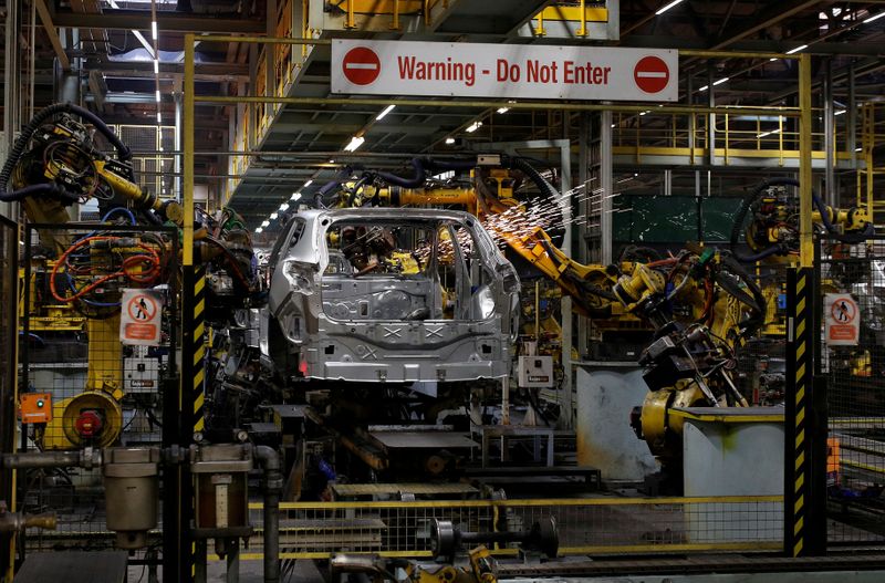 &copy; Reuters. FILE PHOTO: A car is seen on the production line at Nissan&apos;s car plant in Sunderland Britain