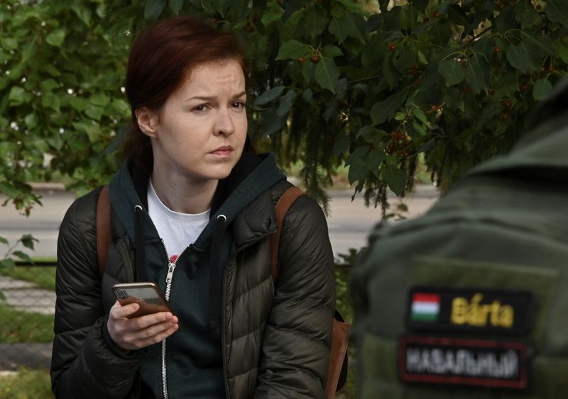 &copy; Reuters. Kira Yarmysh, spokeswoman of Russian opposition leader Alexei Navalny, waits outside a hospital in Omsk