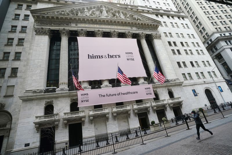 © Reuters. The New York Stock Exchange with a Hims & Hers Health, Inc banner in New York
