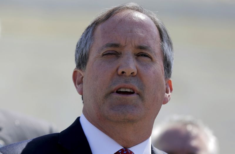 &copy; Reuters. FILE PHOTO:  Texas Attorney General Paxton speaks outside the U.S. Supreme Court after justices heard arguments over the constitutionality of President Obama&apos;s executive action to defer deportation of certain immigrants, in Washington