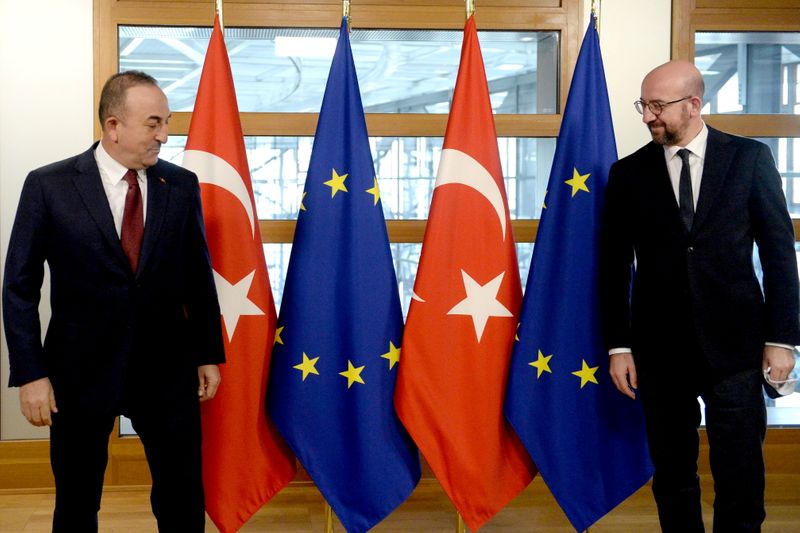 © Reuters. Turkish Foreign Minister Mevlut Cavusoglu and European Council President Charles Michel meet in Brussels