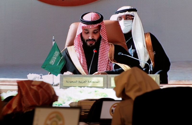 &copy; Reuters. Saudi Arabia&apos;s Crown Prince Mohammed bin Salman is pictured via screen as he talks during the Gulf Cooperation Council&apos;s (GCC) 41st Summit, at the media centre in Al-Ula