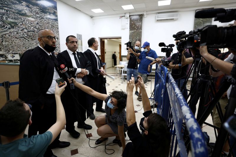 &copy; Reuters. FILE PHOTO: Lawyers representing Malka Leifer, a former Australian school principal accused of sexually assaulting students, speak to members of the media after a verdict was heard in the extradition case against Leifer, at Jerusalem&apos;s District Court