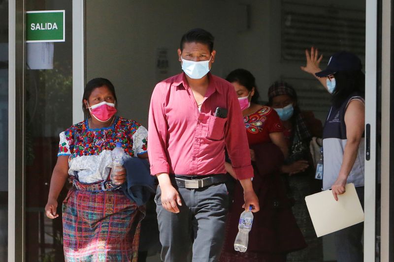 &copy; Reuters. Members of Guatemalan Maya families, who feared their relatives were among 19 bodies found shot and burnt at the weekend in a remote part of northern Mexico, arrive to the Faculty of Medicine for DNA samples to help in the identification, in Guatemala Cit