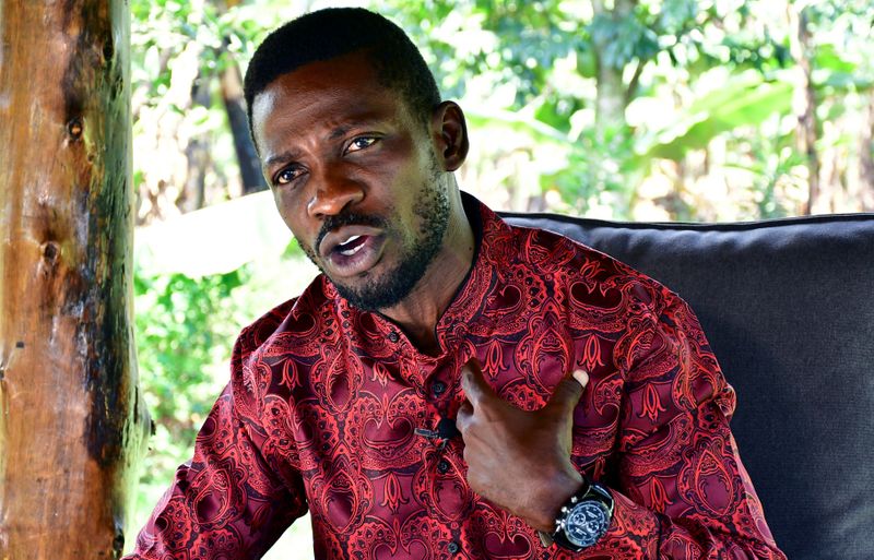 &copy; Reuters. Ugandan opposition presidential candidate Robert Kyagulanyi, also known as Bobi Wine, talks during an interview with Reuters at his home in Magere