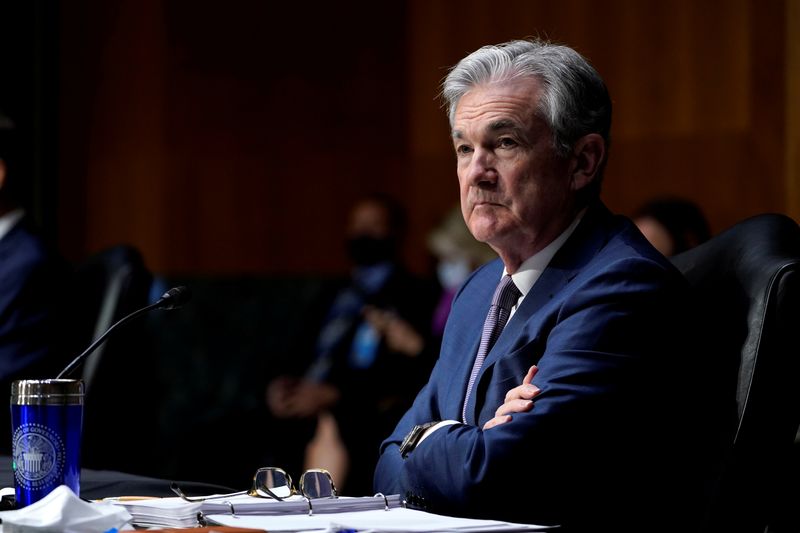 © Reuters. FILE PHOTO: Chairman of the Federal Reserve Jerome Powell listens during a Senate Banking Committee hearing in Washington