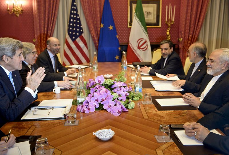 &copy; Reuters. FILE PHOTO: John Kerry, Ernest Moniz, Robert Malley, Abbas Araghchi, Ali Akbar Salehi and Javad Zarif wait to start a meeting at the Beau Rivage Palace Hotel in Lausanne