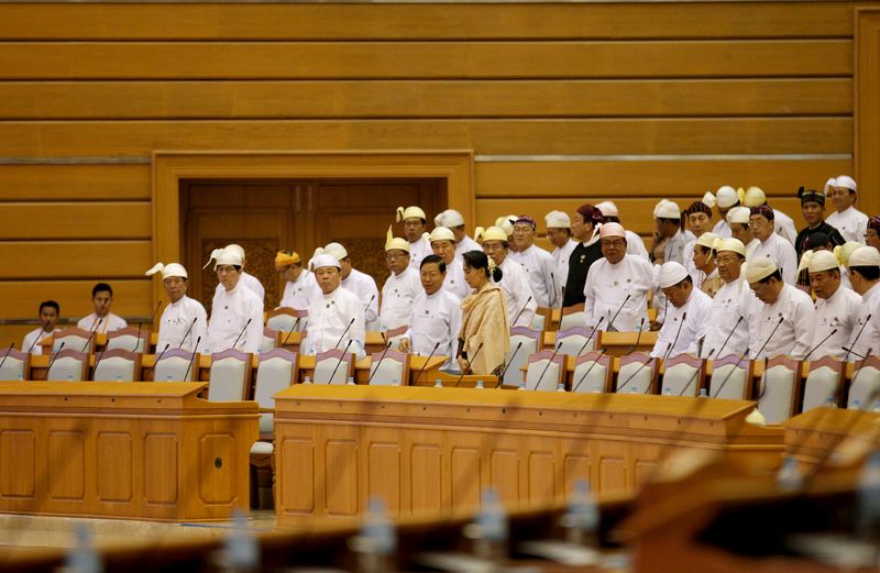 &copy; Reuters. National League for Democracy party (NLD) leader Aung San Suu Kyi stands as she attends the last day of Union Parliament session in Naypyitaw, Myanmar