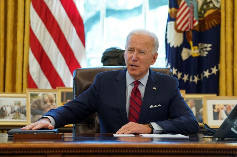 &copy; Reuters. FILE PHOTO: U.S. President Biden signs executive orders on access to affordable healthcare in Washington