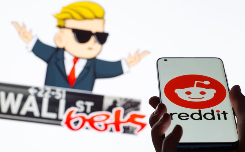 &copy; Reuters. The Reddit logo is seen on a smartphone in front of a displayed Wall Street Bets logo in this illustration