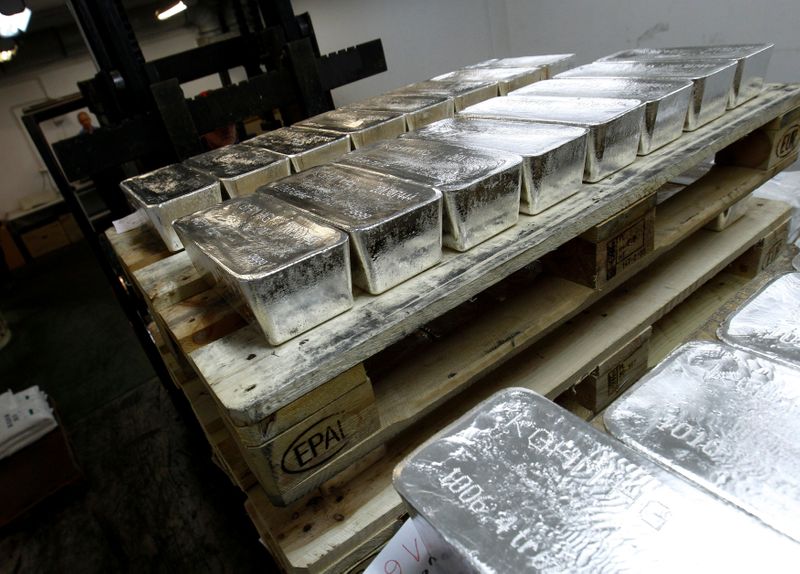 © Reuters. FILE PHOTO: Bars of silver are placed on wooden pallets at the KGHM copper and precious metals smelter processing plant in Glogow