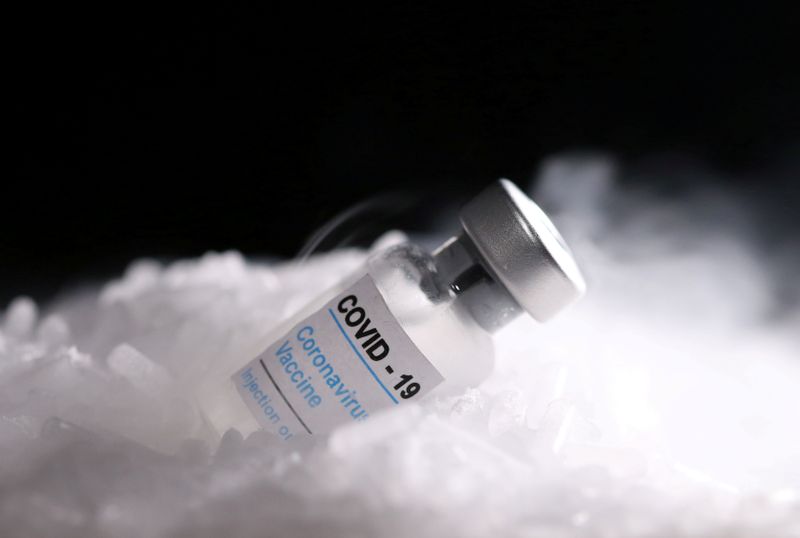 &copy; Reuters. FILE PHOTO: Vials labelled &quot;COVID-19 Coronavirus Vaccine&quot; are placed on dry ice in this illustration