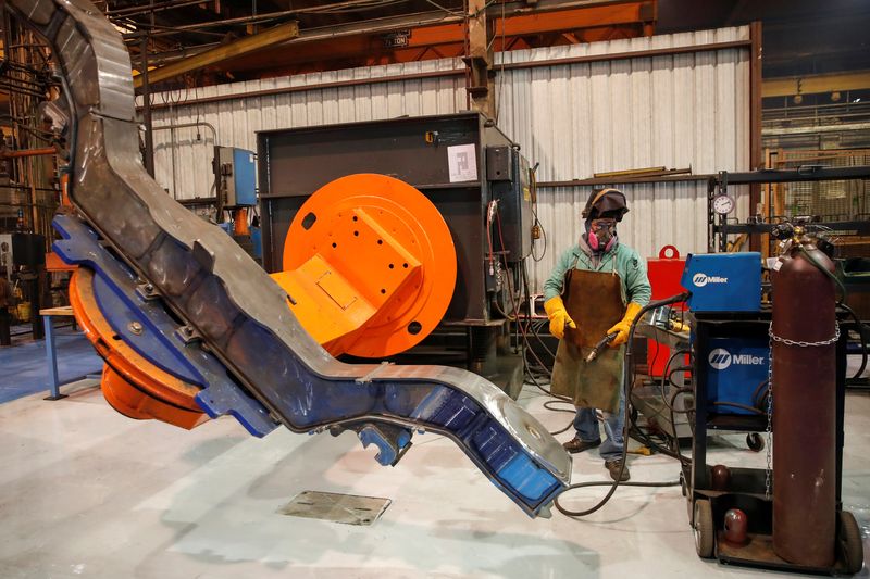 © Reuters. A LB Steel LLC's employee manufactures a component for new Amtrak Acela trains in Harvey, Illinois.