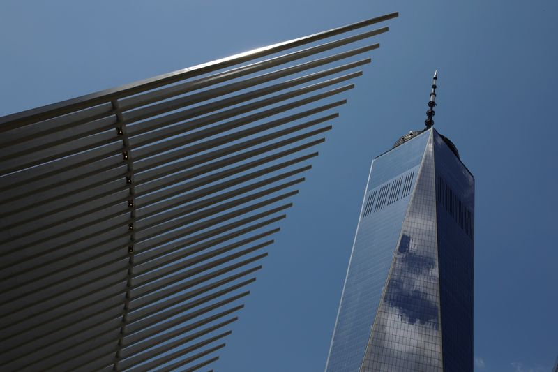 &copy; Reuters. The Oculus transportation hub rises towards One World Trade in New York