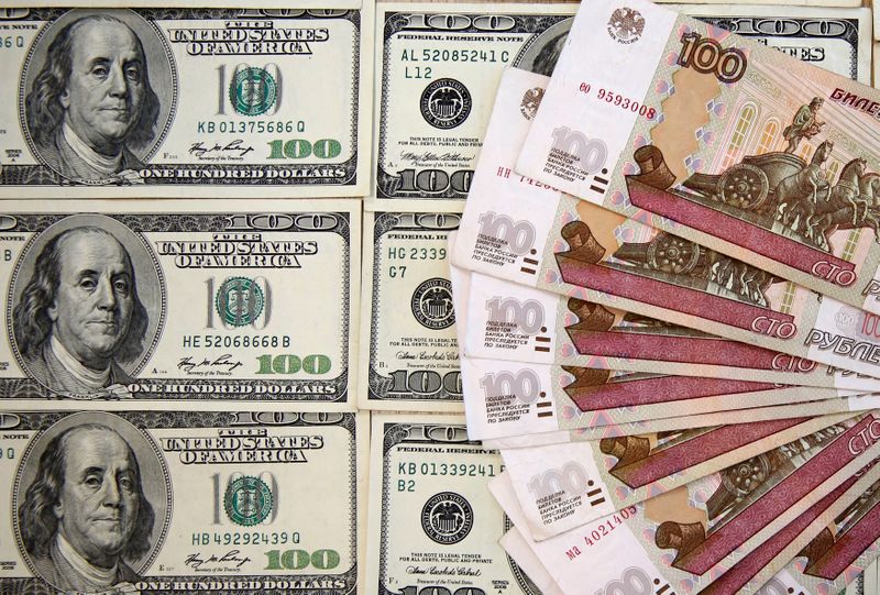 &copy; Reuters. A picture illustration shows Russian rouble and U.S. dollar banknotes in Sarajevo