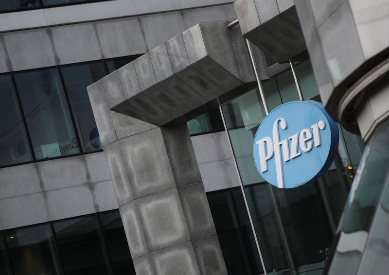 &copy; Reuters. The Pfizer logo is pictured in Brussels