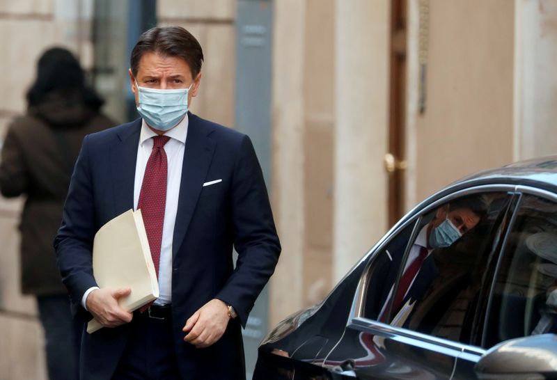 &copy; Reuters. FILE PHOTO: Italy&apos;s caretaker Prime Minister Giuseppe Conte leaves his house