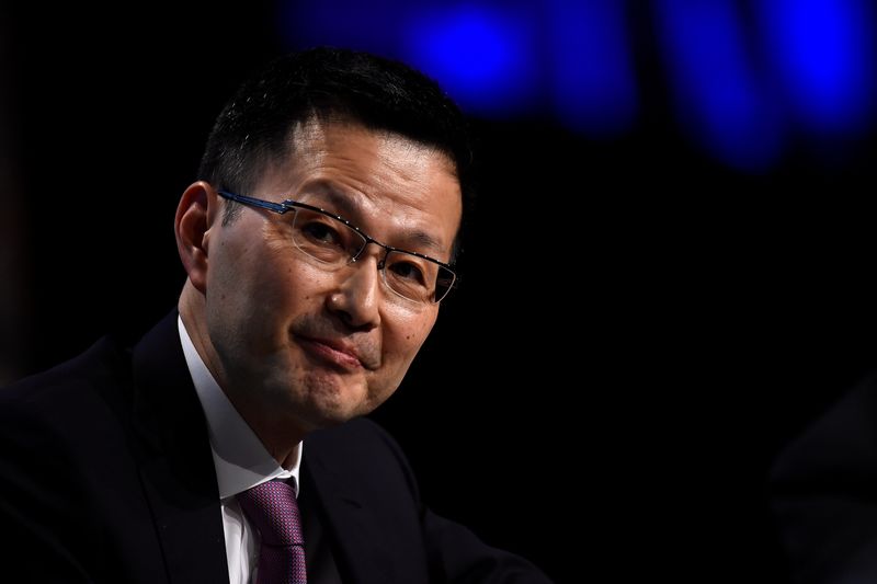 © Reuters. FILE PHOTO: Deputy Governor at the Bank of Japan, Masazumi Wakatabe speaks at a European Financial Forum event in Dublin