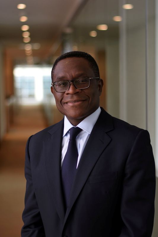 © Reuters. Bernard Mensah, President of International for Bank of America poses at the Bank of America's office, in London