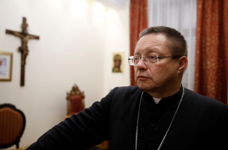 &copy; Reuters. Archbishop Grzegorz Rys looks on after an interview with Reuters