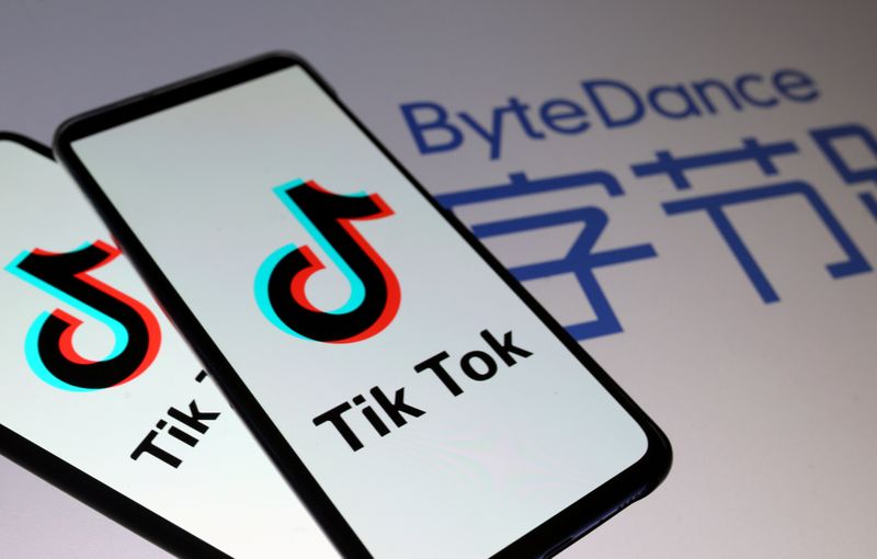 &copy; Reuters. FILE PHOTO: Tik Tok logos are seen on smartphones in front of displayed ByteDance logo in this illustration