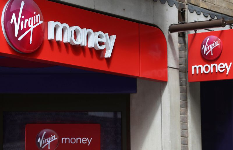 &copy; Reuters. FILE PHOTO: Signs are displayed on a Virgin Money store in London