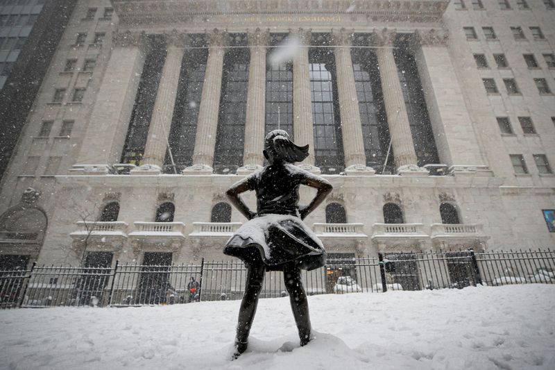 &copy; Reuters. FILE PHOTO: The &quot;Fearless Girl&quot; sculpture is seen outside NYSE during a snow storm in New York