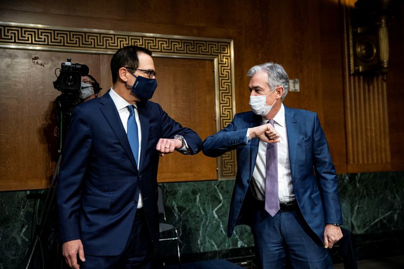 &copy; Reuters. FILE PHOTO: Mnuchin and Powell exchange greetings