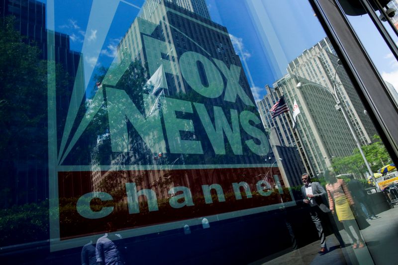 © Reuters. FILE PHOTO: A Fox News channel sign is seen at the News Corporation building in the Manhattan borough of New York City, New York