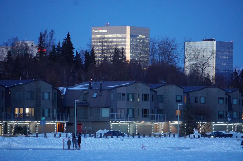 © Reuters. FILE PHOTO: The ConocoPhillips Alaska Inc. building overlooks the frozen Westchester Lagoon in downtown Anchorage