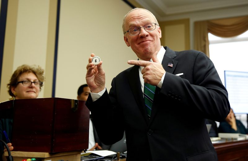 &copy; Reuters. FILE PHOTO: Representative-elect Ron Wright (R-TX) reacts to drawing number 6 during a lottery for office assignments on Capitol Hill in Washington