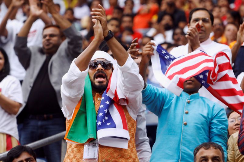 &copy; Reuters. FILE PHOTO: Supporters react during a &quot;Howdy, Modi&quot; rally celebrating India&apos;s Prime Minister Narendra Modi at NRG Stadium in Houston, Texas