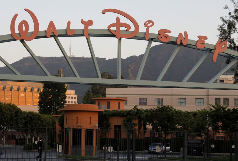 &copy; Reuters. FILE PHOTO: A portion of the signage at the main gate of The Walt Disney Co. is pictured in Burbank, California
