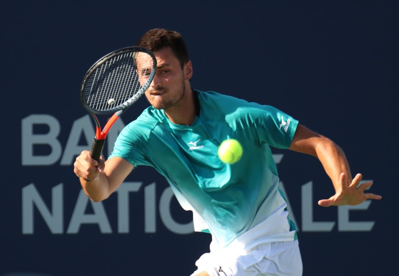 Tomic bows out in wonder at player he might have been