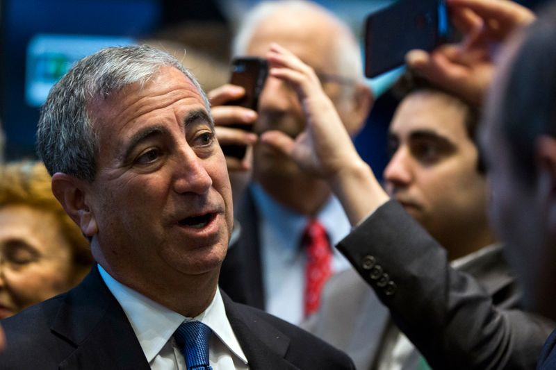 &copy; Reuters. Chief executive officer of Moelis &amp; Co., Ken Moelis smiles after ringing the bell to mark the company&apos;s IPO on the floor of the New York Stock Exchange shortly after the opening bell in New York