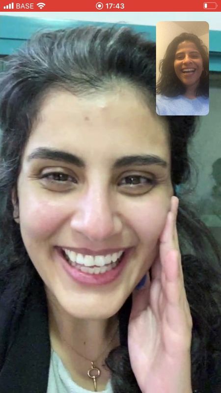 © Reuters. Women's rights activist Loujain al-Hathloul chats via video call with her sister Lina al-Hathoul