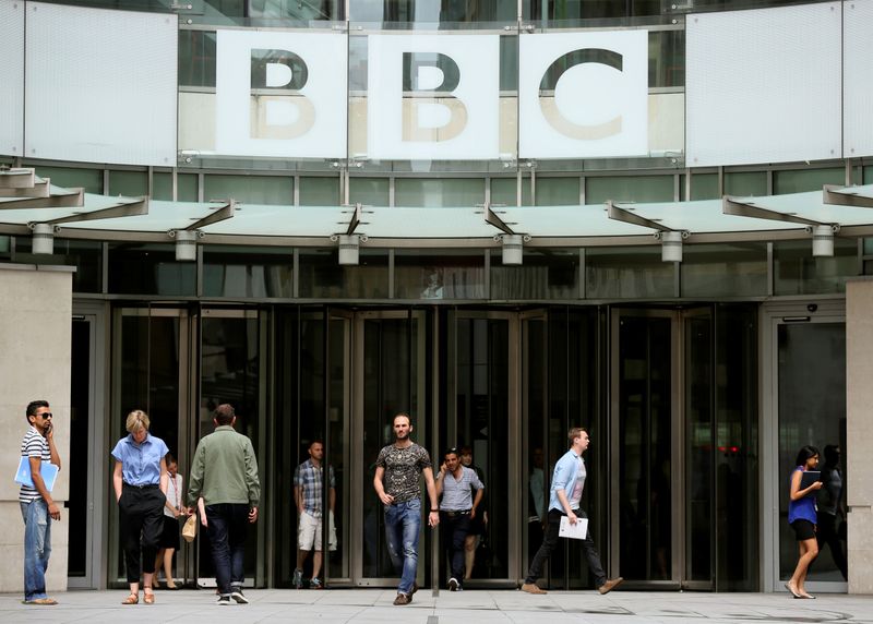 &copy; Reuters. FILE PHOTO: People arrive and depart from Broadcasting House, the headquarters of the BBC in London