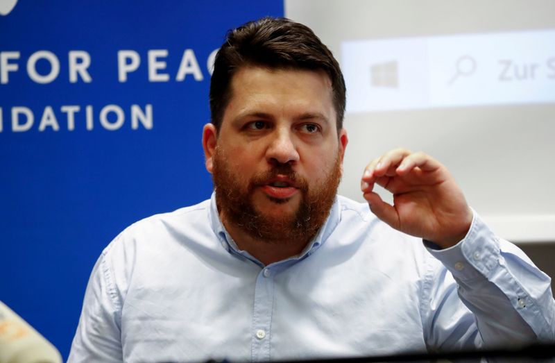 &copy; Reuters. FILE PHOTO: Leonid Volkov, an ally of Russian opposition politician Alexei Navalny, speaks during a news conference in Berlin