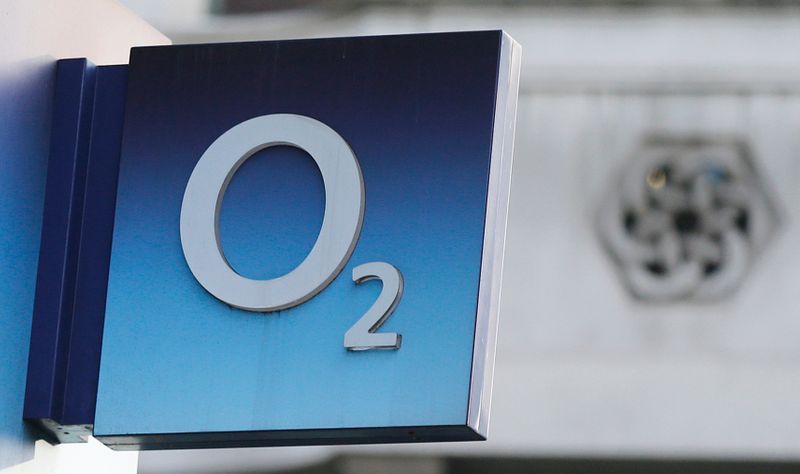 &copy; Reuters. FILE PHOTO: A sign hangs outside an O2 mobile phone shop in central London