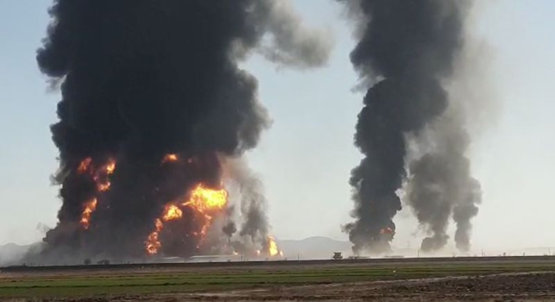 &copy; Reuters. Fire and smoke rise from an explosion of a gas tanker in Herat