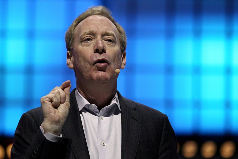 &copy; Reuters. FILE PHOTO: Microsoft&apos;s President Brad Smith speaks at the Web Summit, in Lisbon