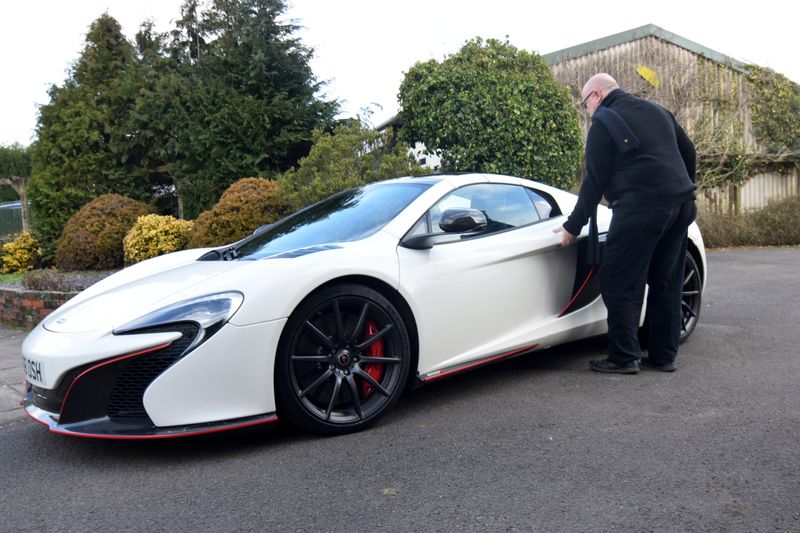 &copy; Reuters. Abbosh stands next to McLaren at his home in Farnham