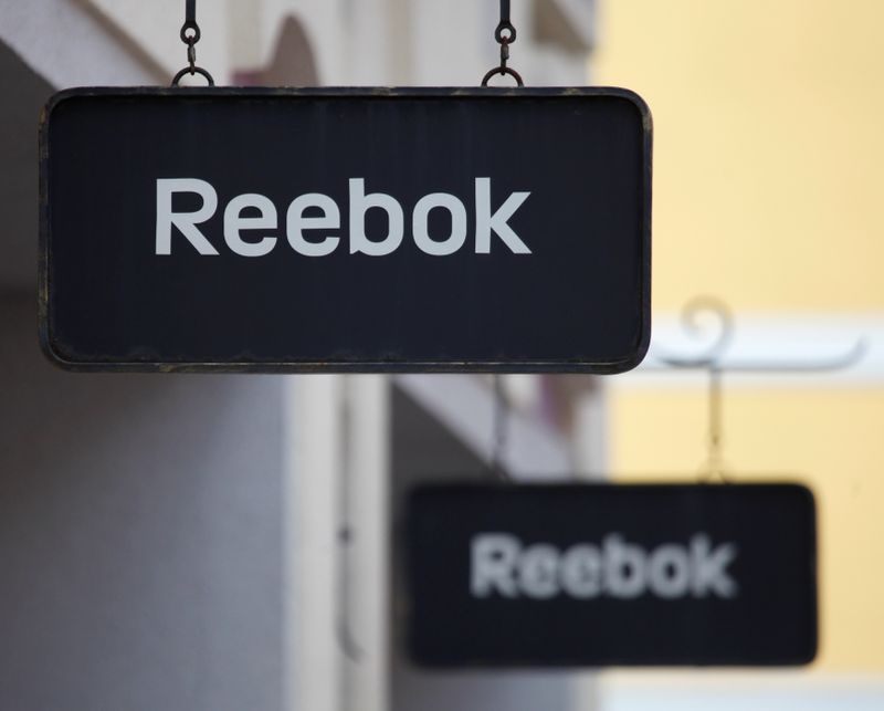 &copy; Reuters. Boards with Reebok store logo are seen on a shopping center at the outlet village Belaya Dacha outside Moscow