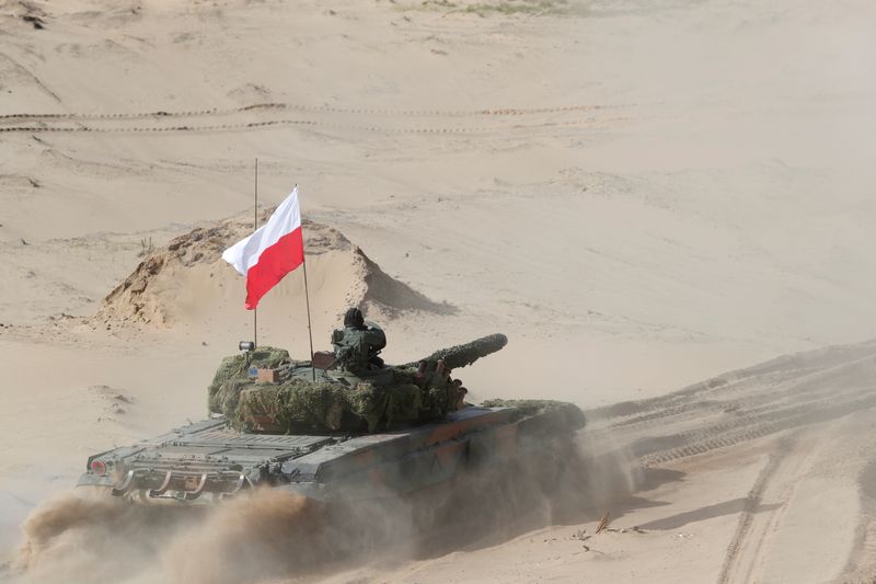 &copy; Reuters. FILE PHOTO: Polish Army PT-91 tank of NATO enhanced Forward Presence battle group attends live shooting training during exercise Steele Crescendo as the coronavirus disease (COVID-19) continues in Adazi, Latvia May 8, 2020